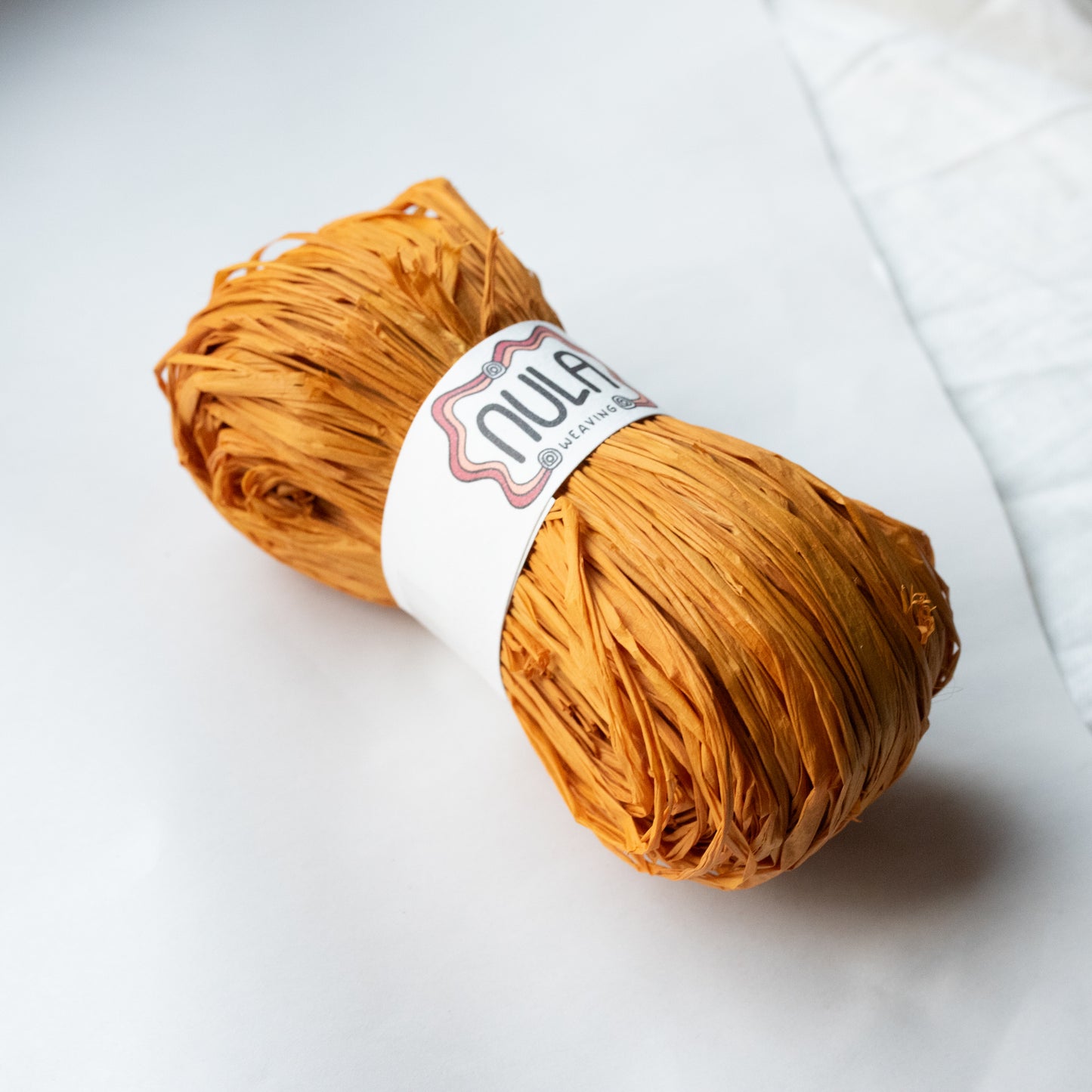 hand-dyed raffia: 70g Amber