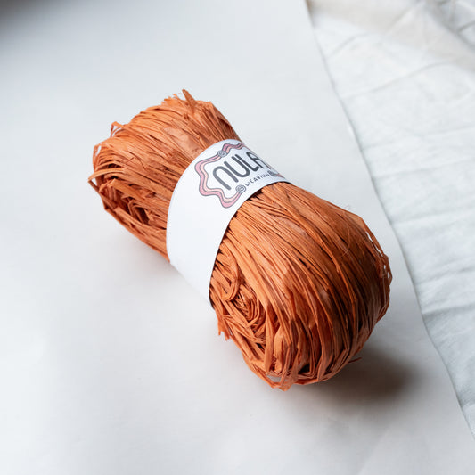 hand-dyed raffia: 70g Sunset Clay